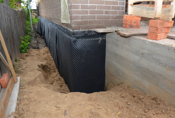 SJ Waterproofing Pros technician performing targeted Emergency Waterproofing assessment in Willard, NY